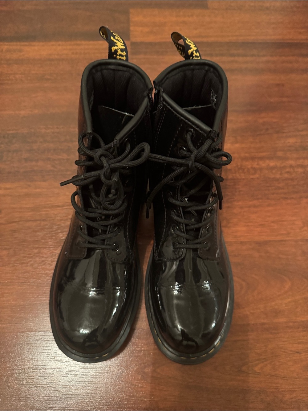 Dr. Martens Kids Black Patent Lace-Up Boots with Yellow Heel Loop